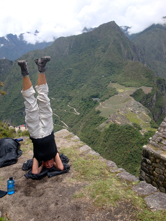 Image of Julie doing headstand at Huayan Picchu